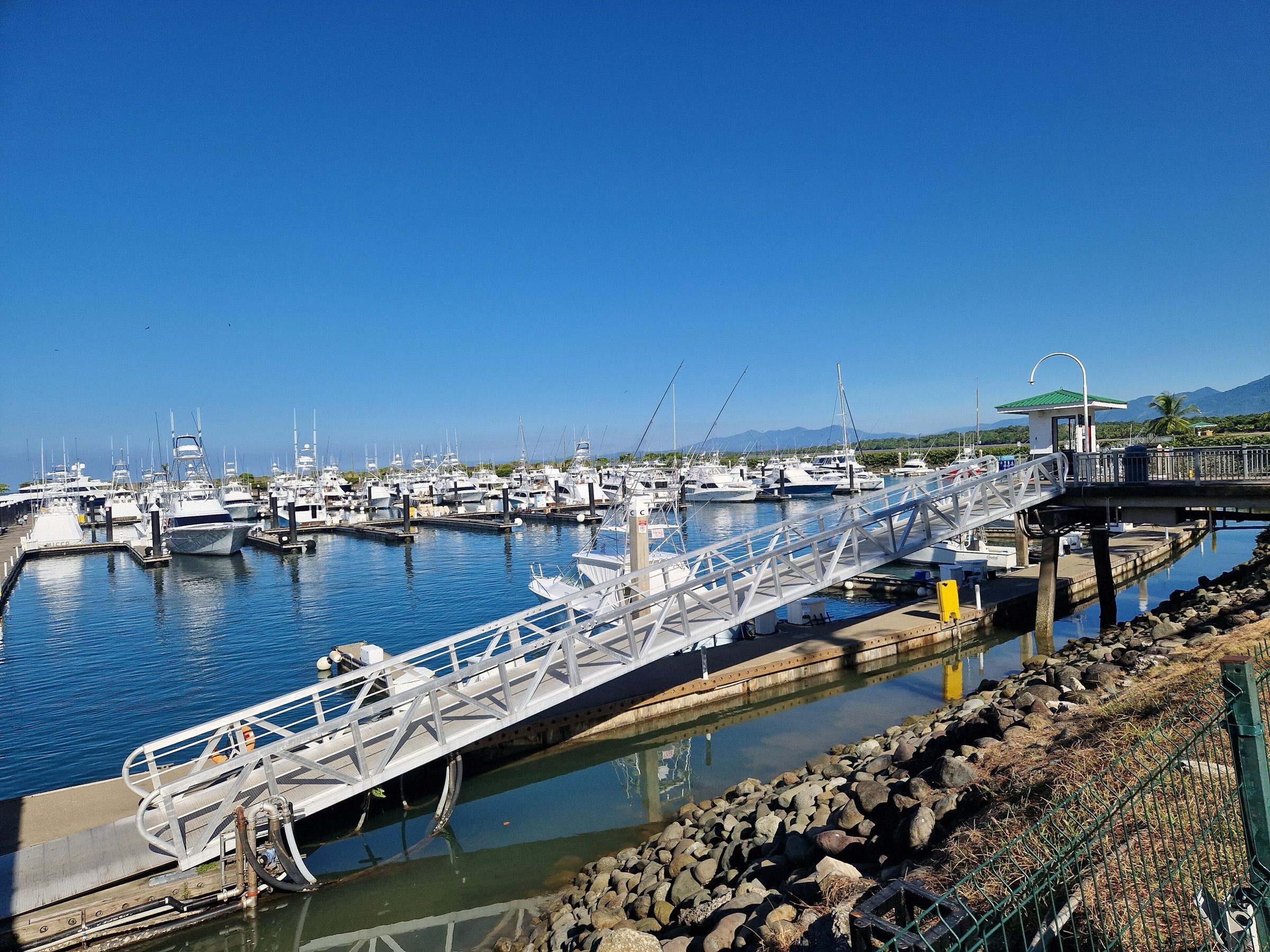 Docks and sportfishing boats at the marina in Quepos on the Pacific coast