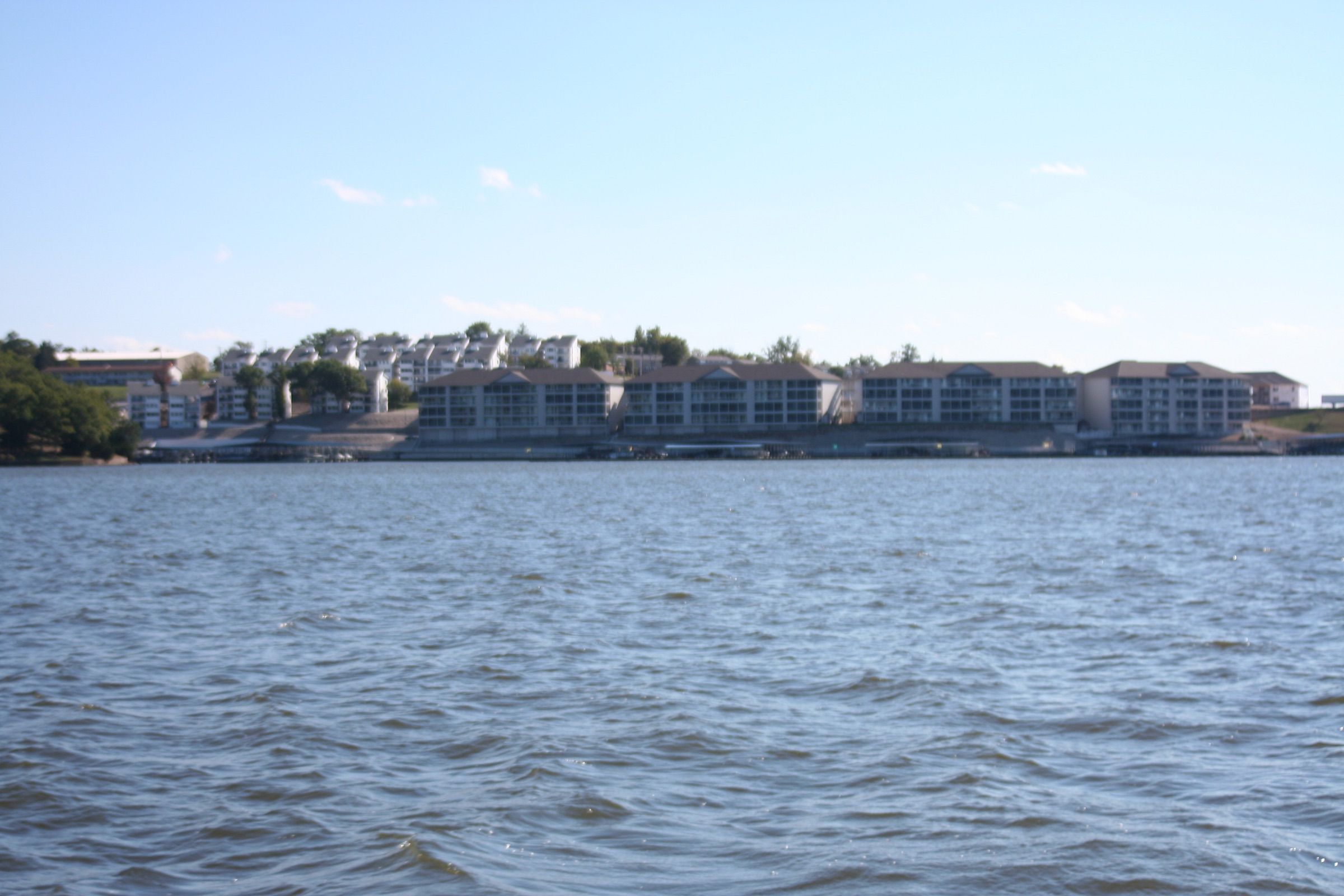 Lakefront condominiums and boat docks along the shore of Lake of the Ozarks