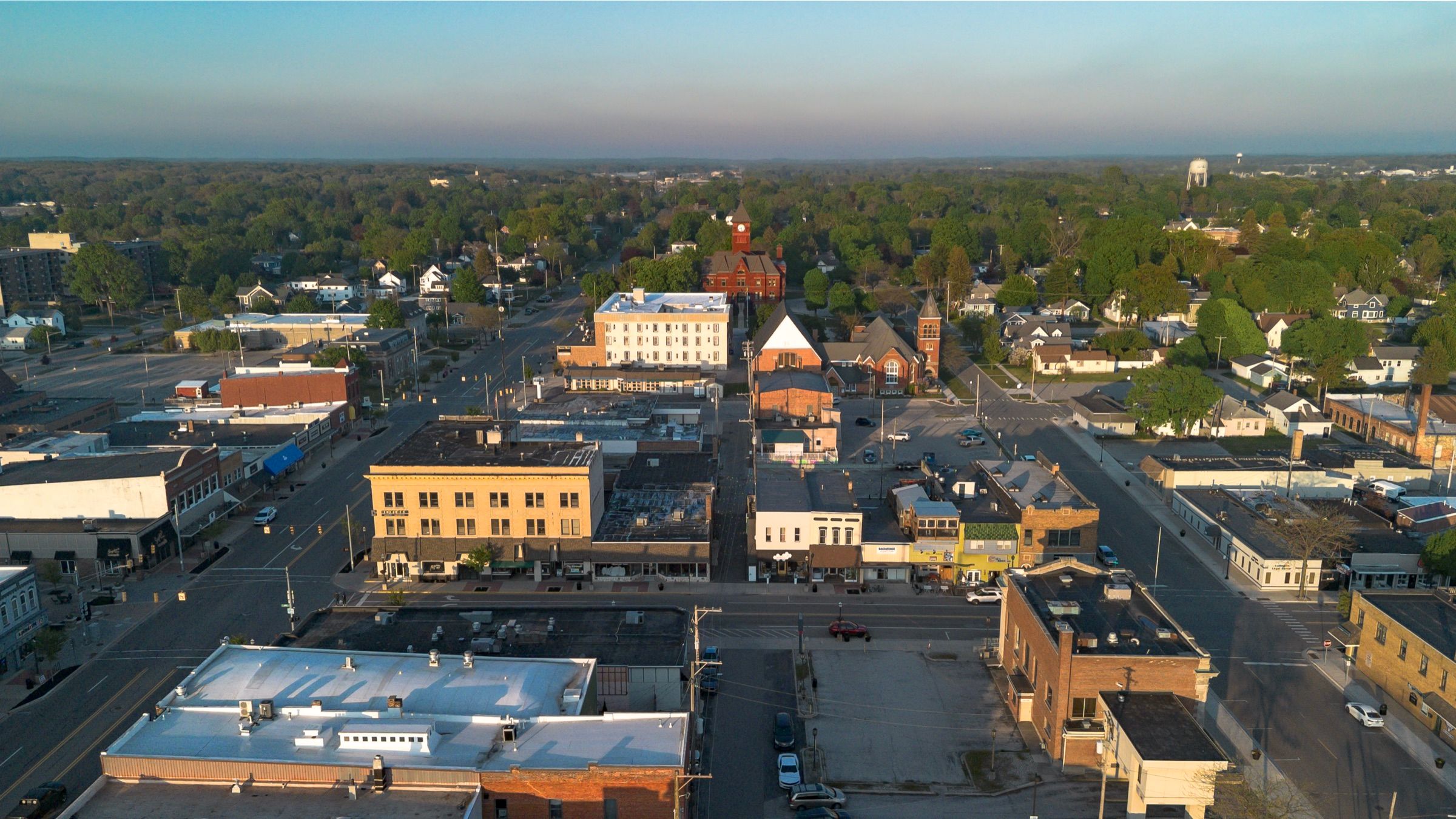 Aerial view over downtown Ludington at golden hour