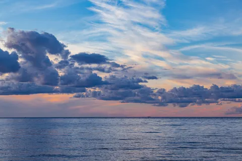 Sunset clouds over open water on Mille Lacs Lake
